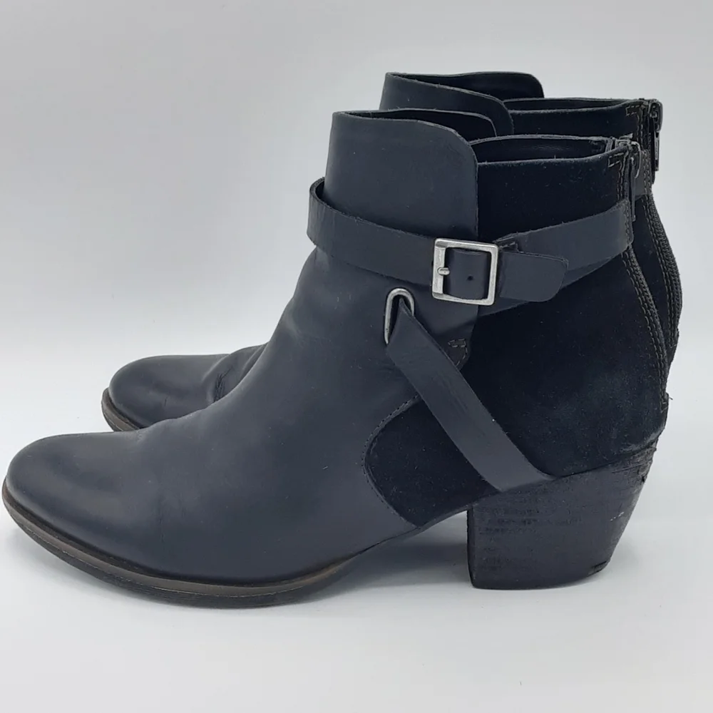 Korks Women's Rohit Black Leather Booties with Buckle Strap